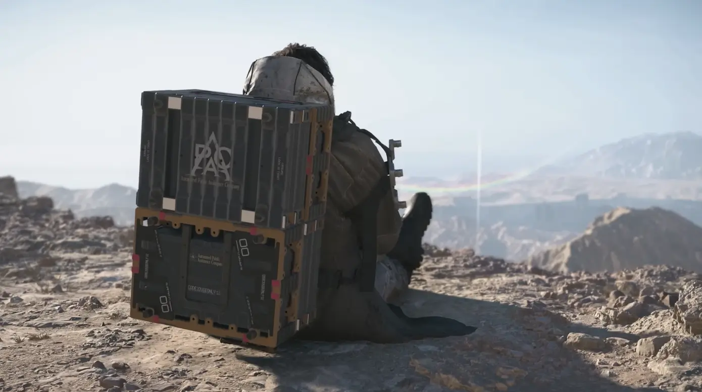 荷物を背負って座るサム | Death Stranding 2